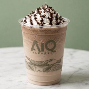 Chocolate frappé with whipped cream and drizzle